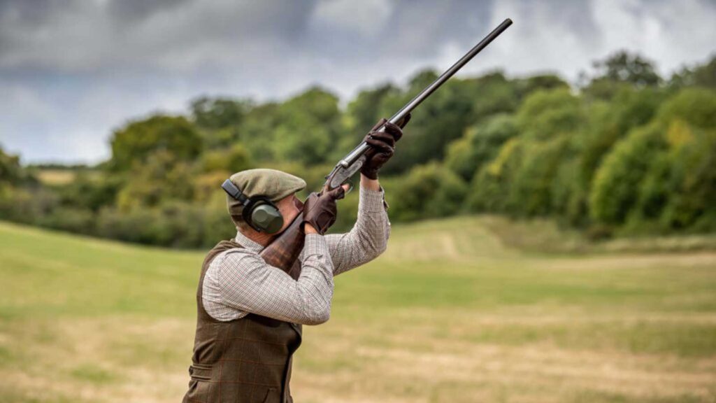 Man shooting side by side shotgun at The Purdey Cup