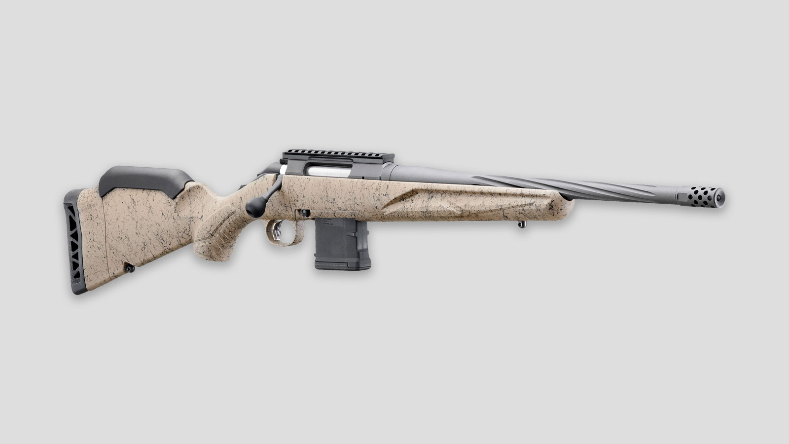 Ruger American Generation II Ranch model bolt action rifle on a grey background